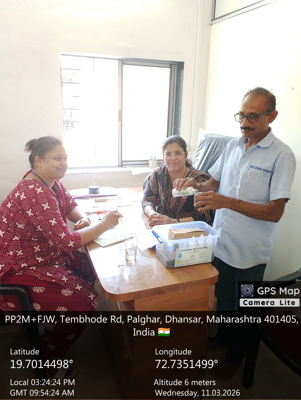 Routine check of village water samples for health and safety.